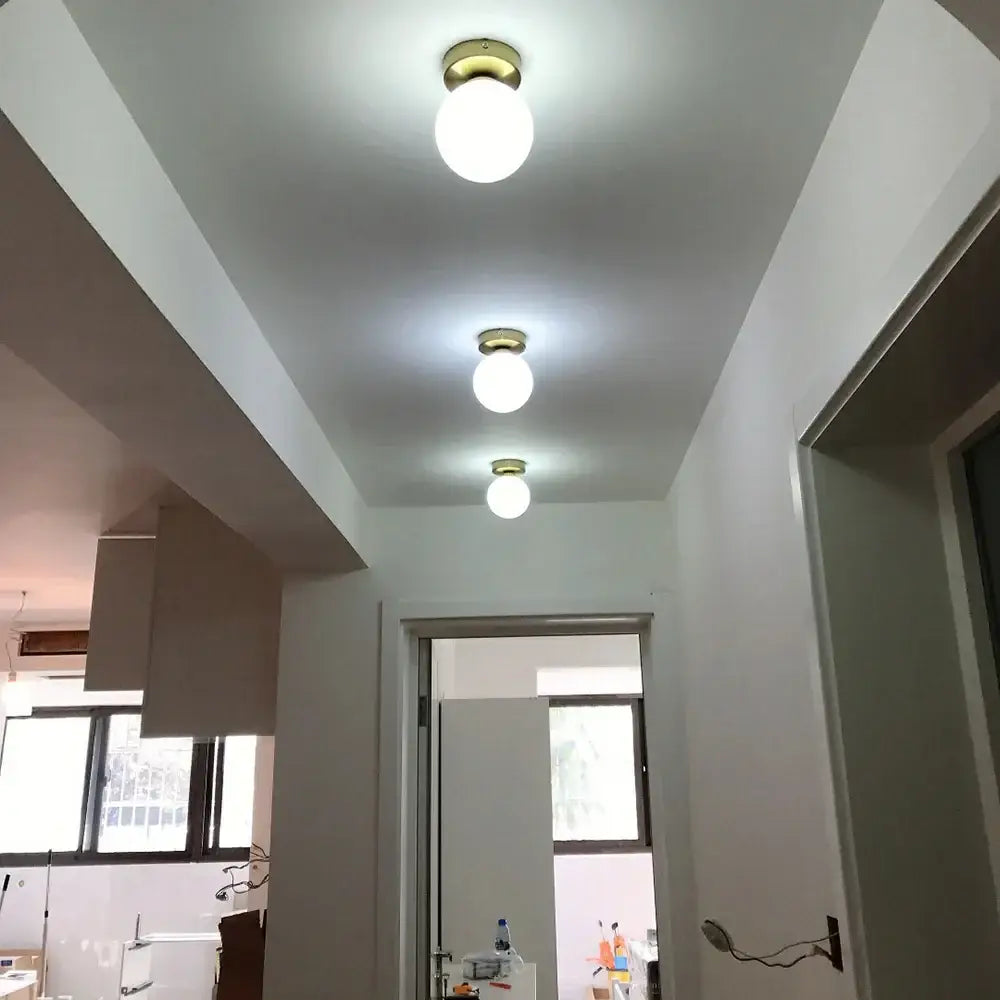 Modern brass glass ball ceiling light for bedroom decor