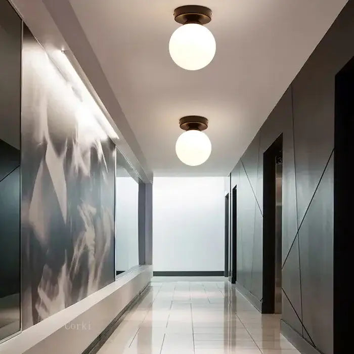 Modern brass & black glass ball ceiling light for living room