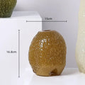 Textured olive beige and amber glass vase living room decor