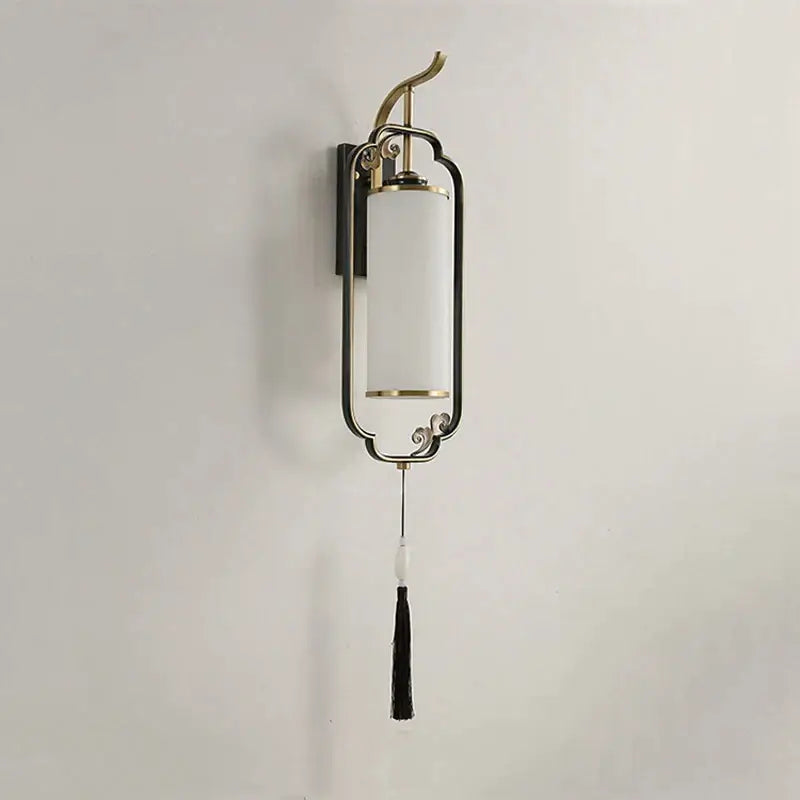 Ornate brass glass wall lamp for living room with frosted shade