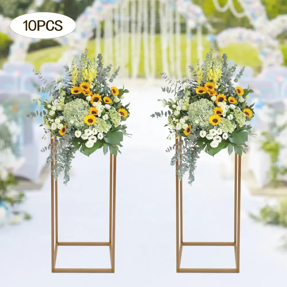 Gold metal wedding flower stand set with pink roses for dining room