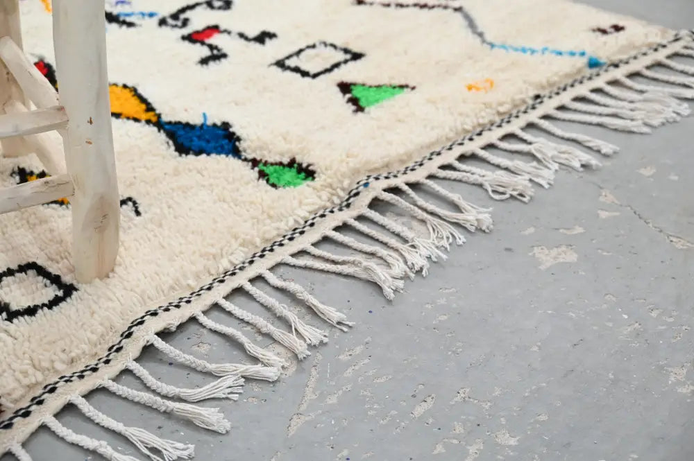 Handmade moroccan azilal rug beige colorful geometric living room