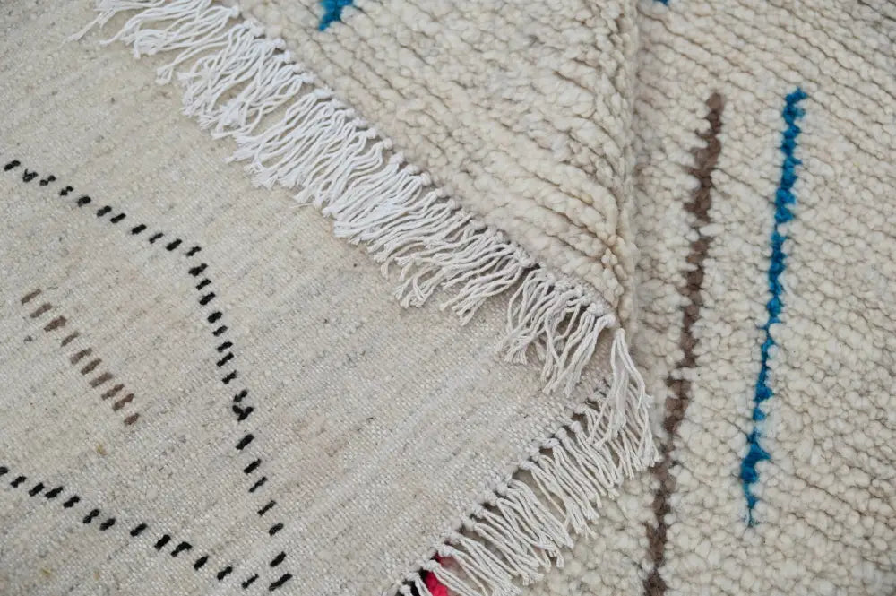 Handmade beige geometric azilal rug – bedroom natural wool decor
