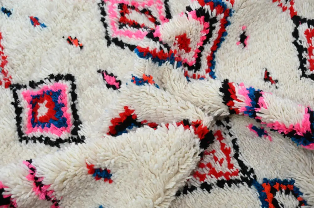 Handmade traditional azilal rug beige and pink bedroom decor