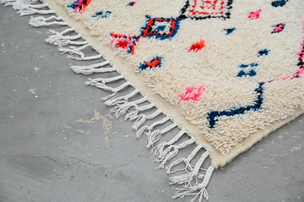 Handmade traditional azilal rug beige and pink bedroom decor
