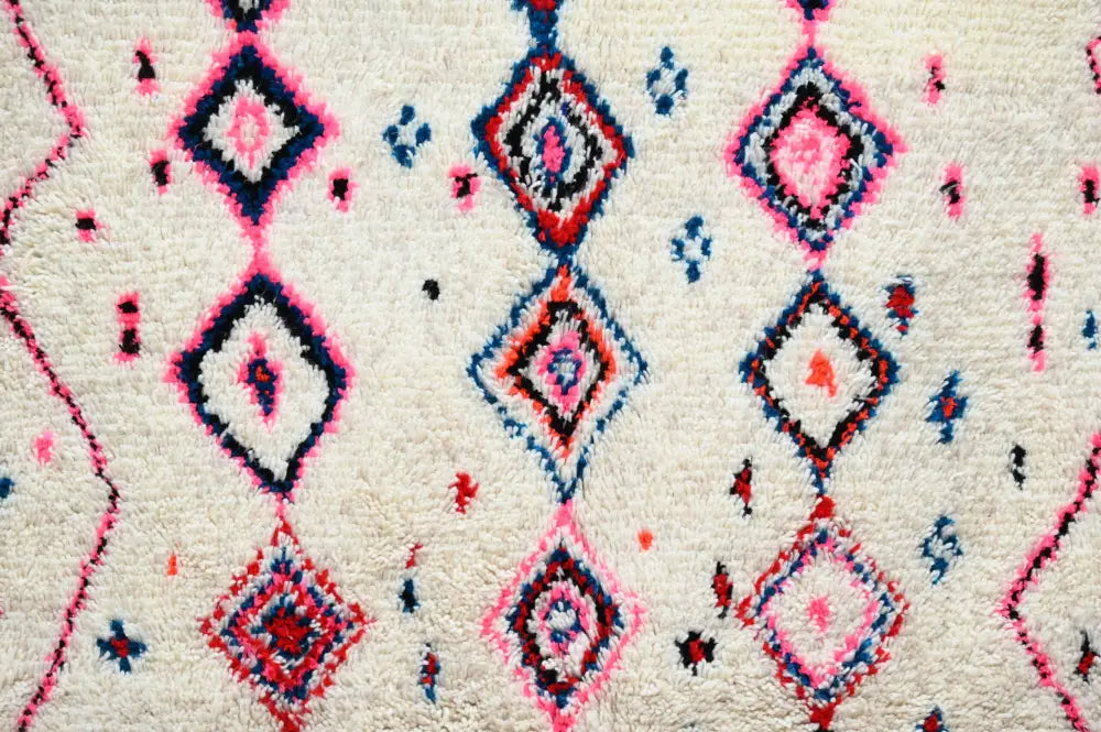 Handmade traditional azilal rug beige and pink bedroom decor