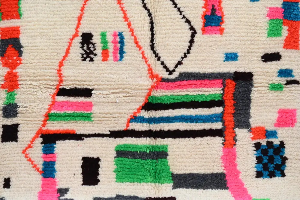 Handmade azilal rug with vibrant colors in natural wool living room