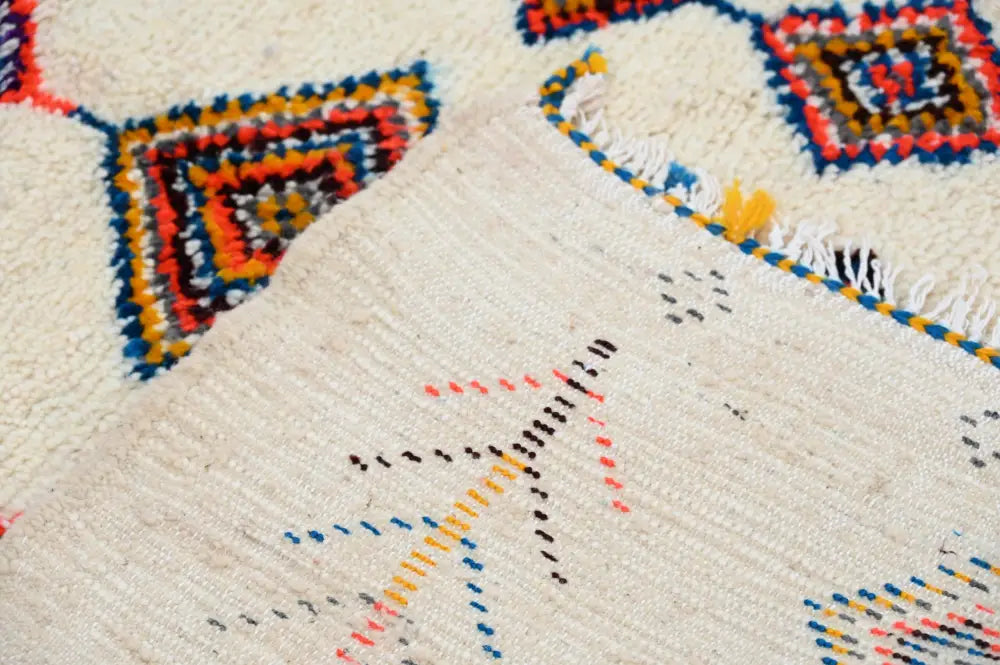 Handmade moroccan azilal rug beige vibrant colors living room decor