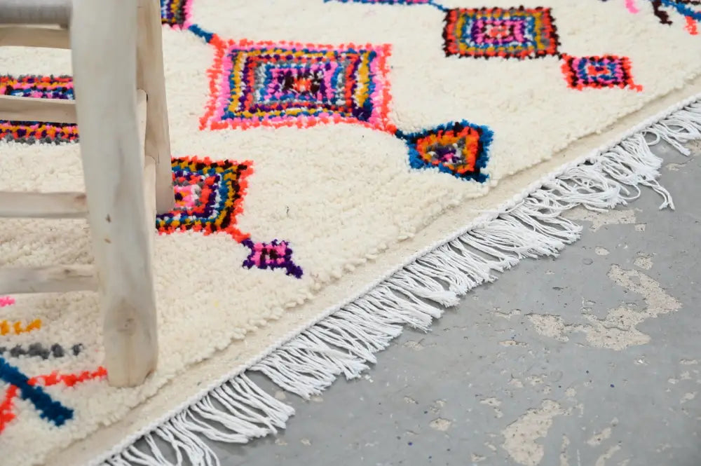 Handmade moroccan azilal rug beige vibrant colors living room decor