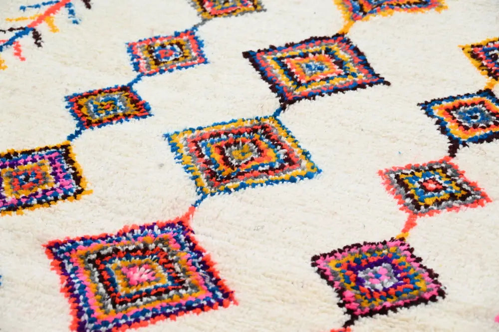 Handmade moroccan azilal rug beige vibrant colors living room decor