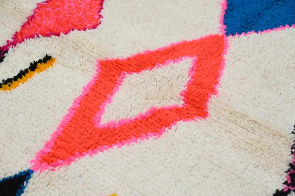 Handmade moroccan azilal rug with vibrant colors for living room