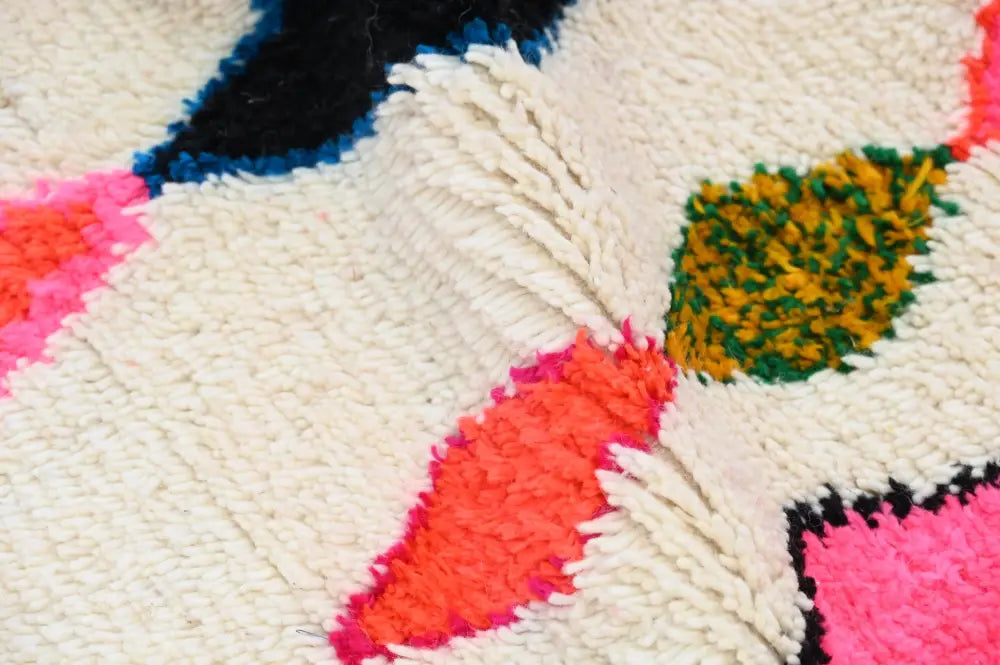 Handmade moroccan azilal rug with vibrant colors for living room