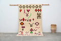 Handmade moroccan azilal rug beige and red living room decor