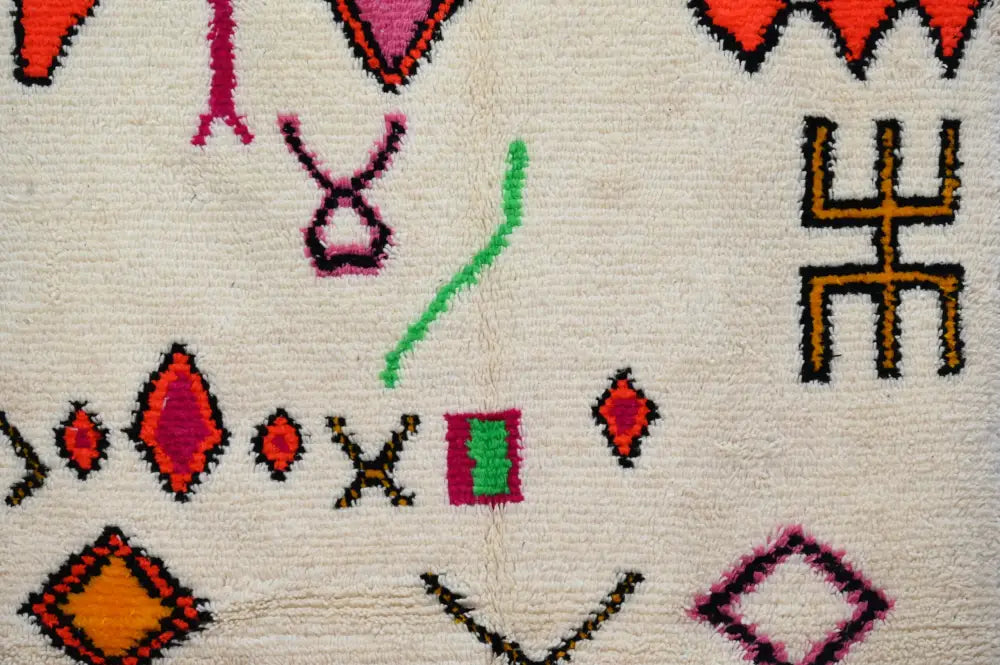 Handmade moroccan azilal rug beige and red living room decor
