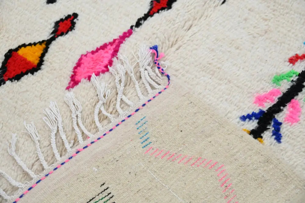 Handmade beige moroccan azilal rug with colorful patterns living room
