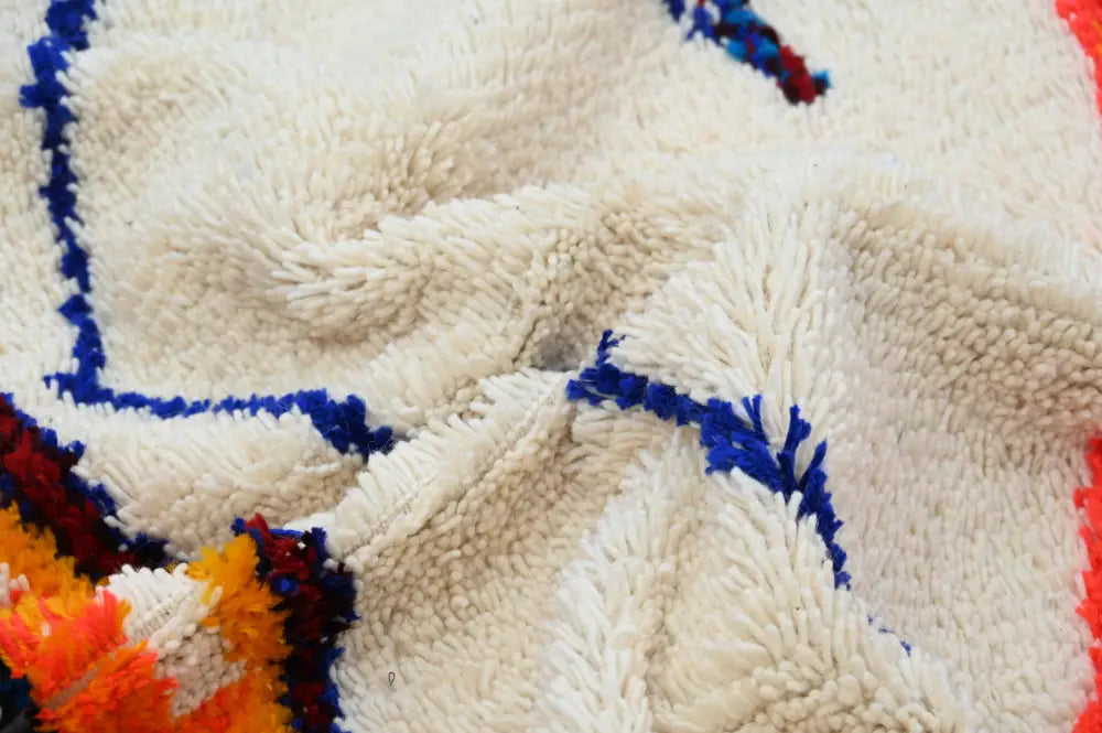 Handmade traditional azilal rug beige and orange bedroom decor