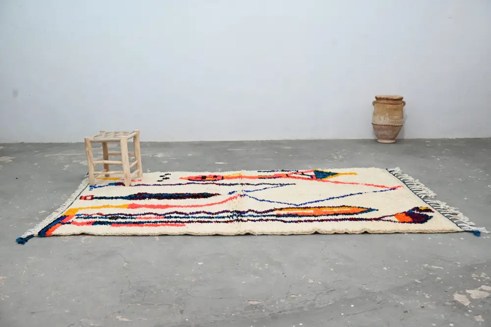 Handmade traditional azilal rug beige and orange bedroom decor