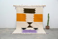Handmade moroccan azilal beige and orange rug bedroom decor