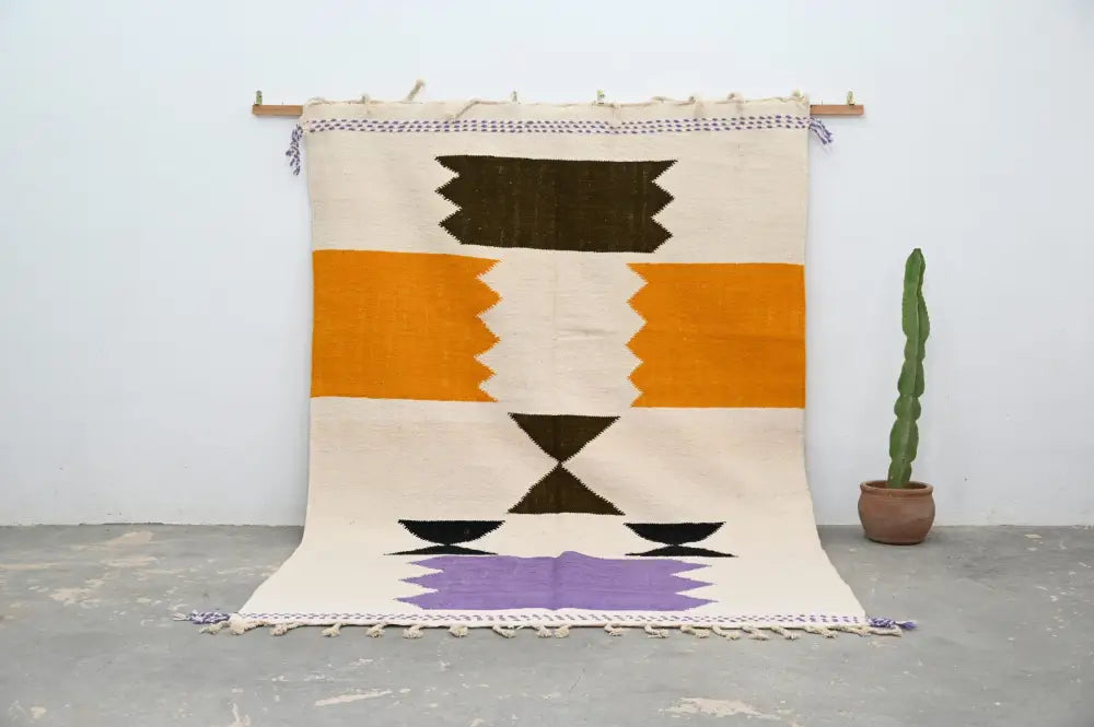 Handmade moroccan azilal beige and orange rug bedroom decor