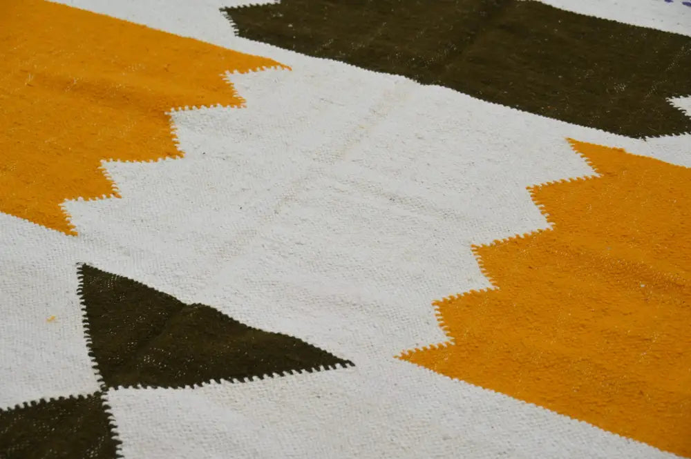 Handmade moroccan azilal beige and orange rug bedroom decor