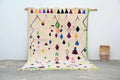 Vibrant cream handmade moroccan azilal rug living room decor