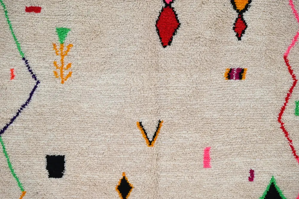 Handmade moroccan azilal rug with vibrant colors for living room