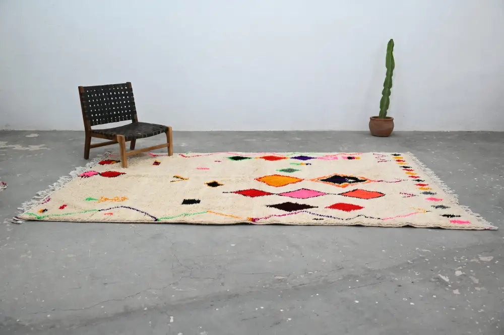 Handmade moroccan azilal rug with vibrant colors for living room