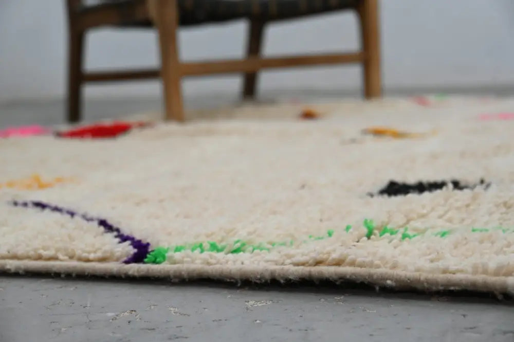Handmade moroccan azilal rug with vibrant colors for living room