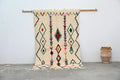 Traditional beige azilal rug with colorful patterns for living room