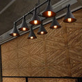 Industrial conical black & rust pendant light – wine bar living room