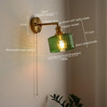 Green ribbed glass wall sconce with pull chain switch for bedroom