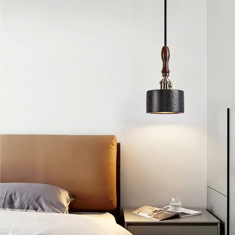 Black travertine cylindrical pendant light for dining room