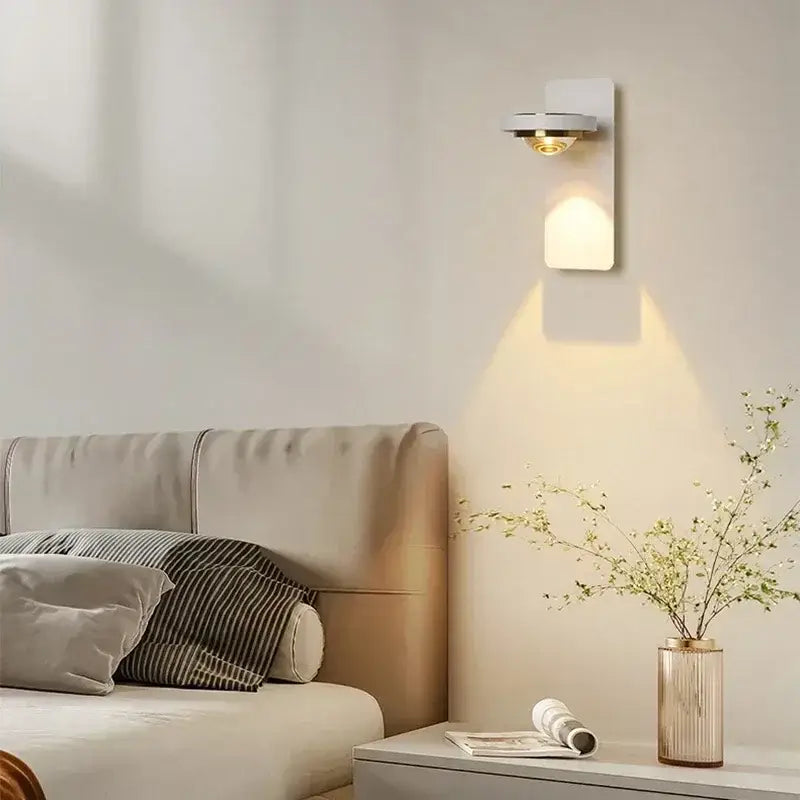 Modern minimalist rotatable wall lamp for bedroom focused lighting