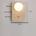 Textured travertine wall light – porch warm yellow sconce