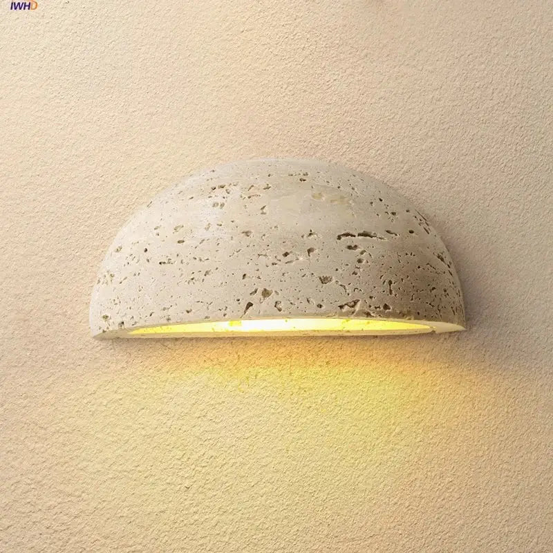 Textured travertine wall light – porch warm yellow sconce
