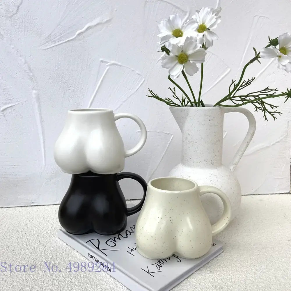 Playful white speckled butt shape ceramic coffee cup kitchen decor