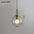Luxe glass ball pendant lights brass and frosted glass dining room