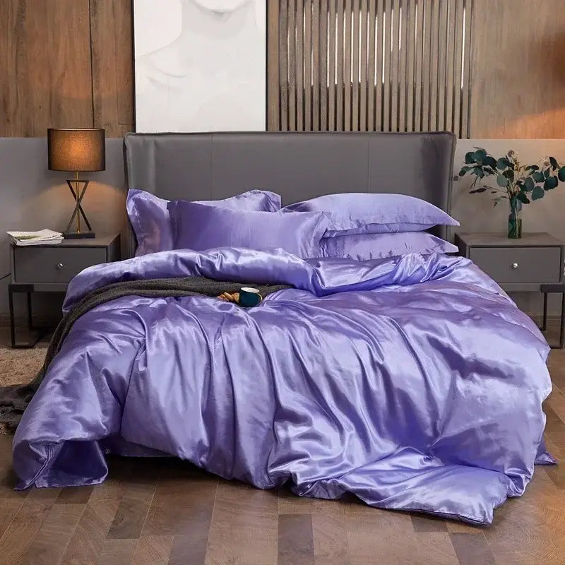 Luxurious crimson satin duvet cover and bed sheet bedroom set