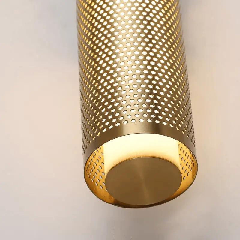 Luxury perforated gold wall sconce bedroom cylindrical light