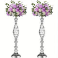 Twisted silver metal vase set with lavender and roses dining room