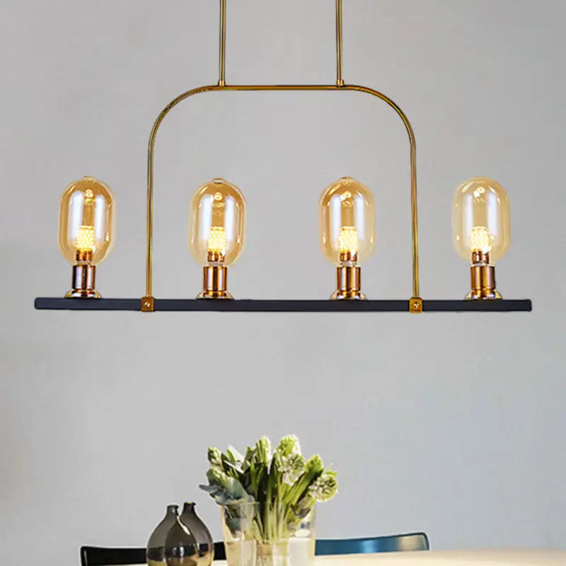 Modern amber glass kitchen island light with black metallic frame