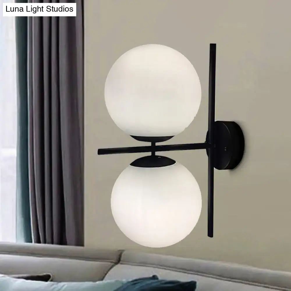 Modern black and white spherical wall light fixture living room