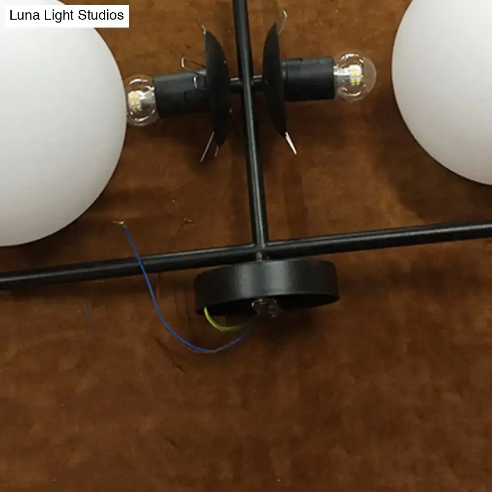 Modern black and white spherical wall light fixture living room