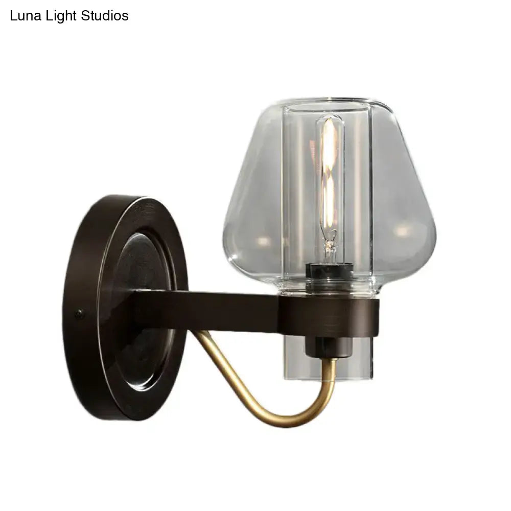 Modern black & brass wall sconce with glass mushroom shade bedroom