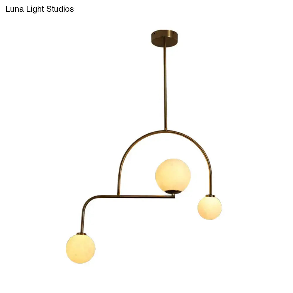 Modern gold global bedroom pendant light with white frosted glass