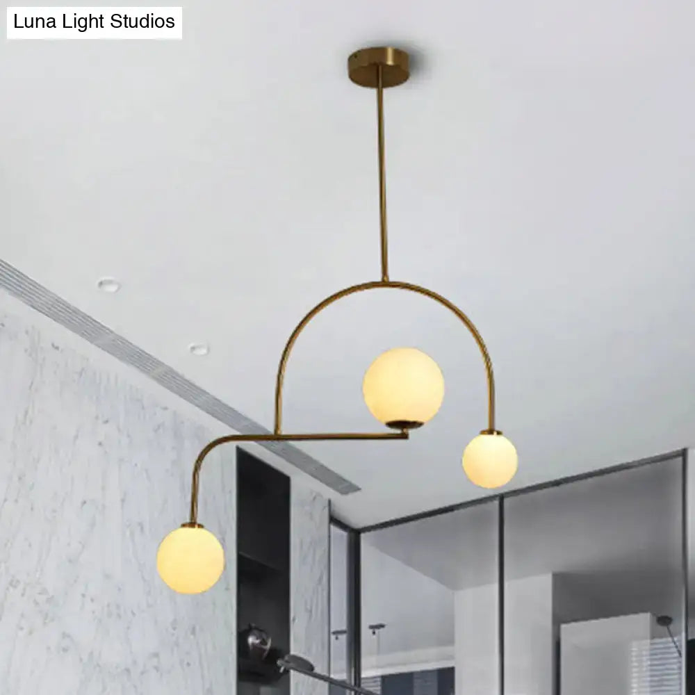 Modern gold global bedroom pendant light with white frosted glass