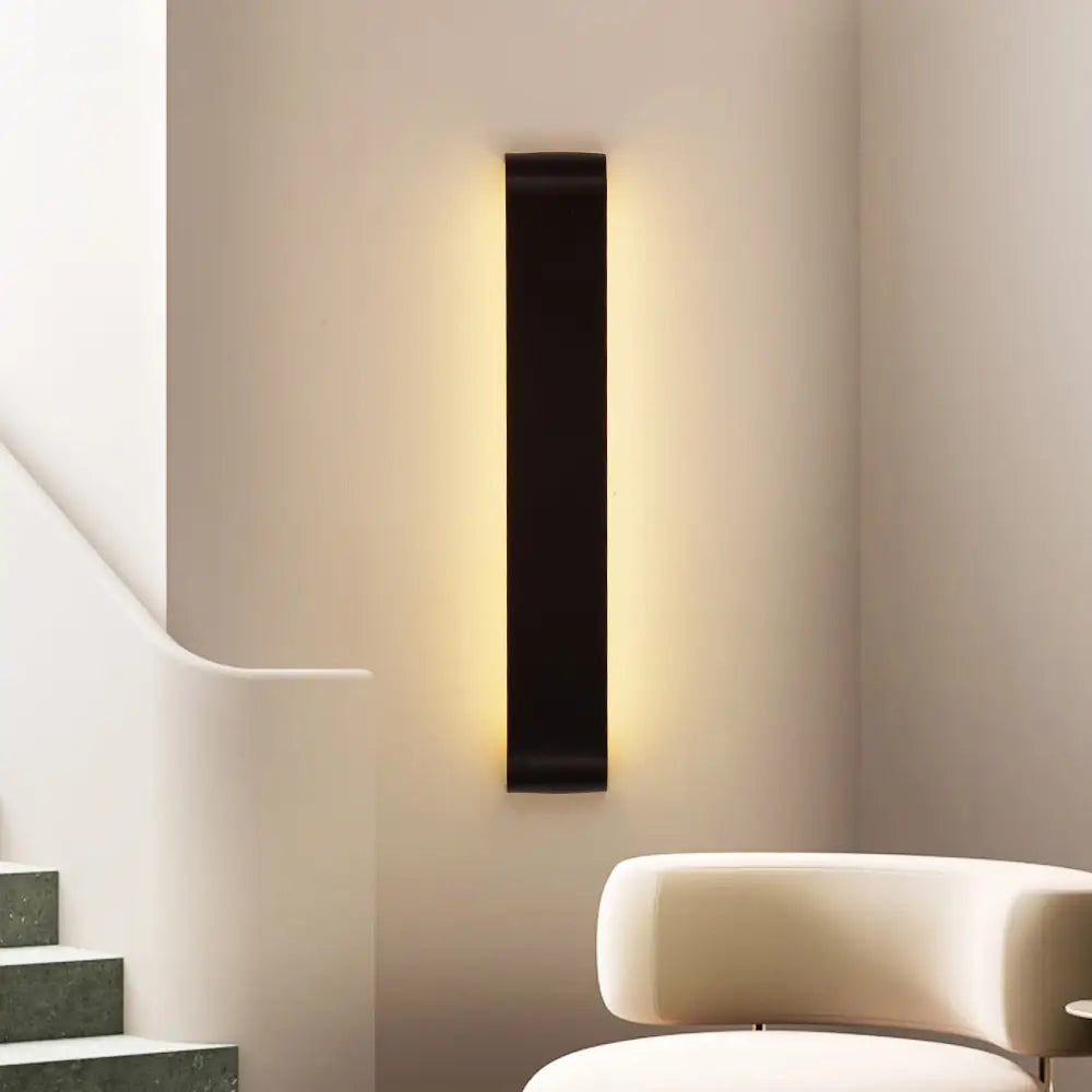 Modern black metal wall sconces – living room ambient lighting