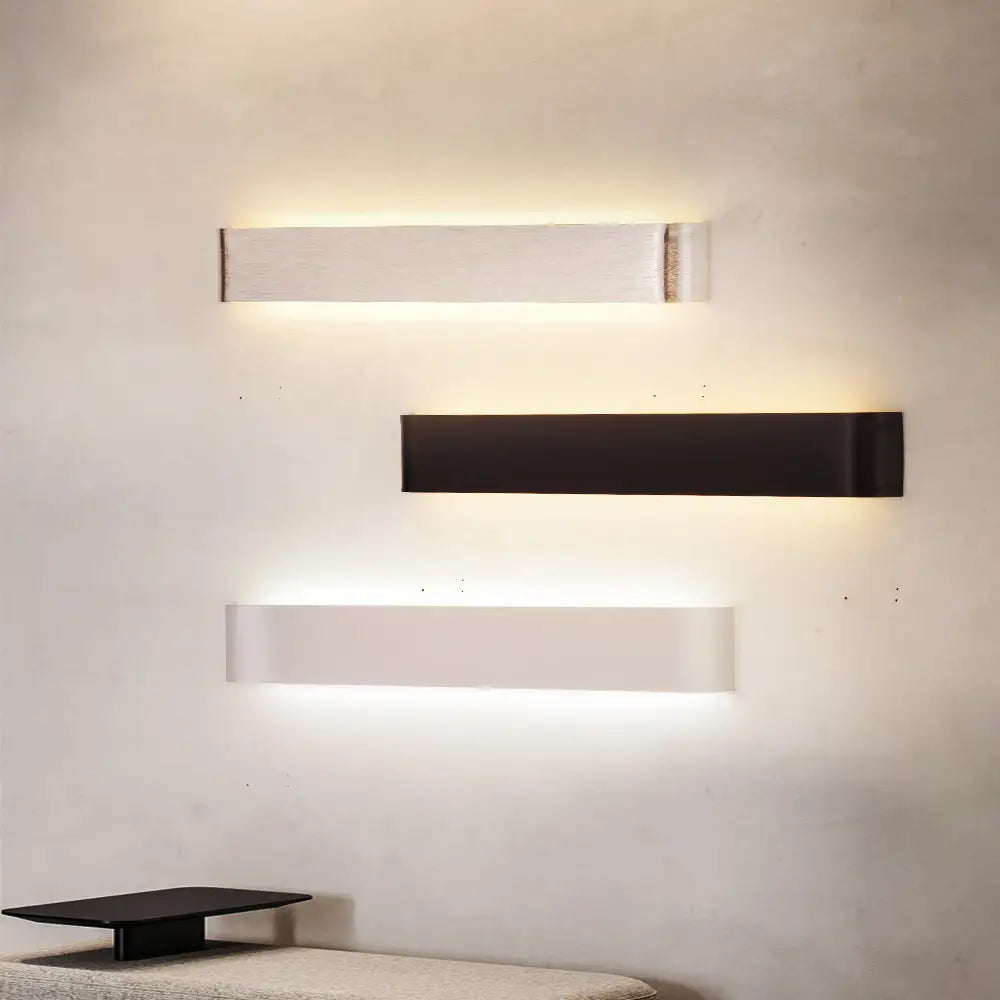 Modern black metal wall sconces – living room ambient lighting