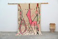 Beige and pink moroccan handmade azilal rug bedroom decor