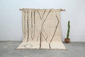 Handmade beige & dark brown beni ouarain rug bedroom geometric decor